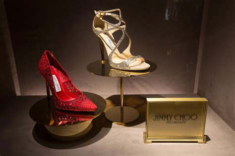 when did michael kors buy jimmy choo|michael kors holdings.